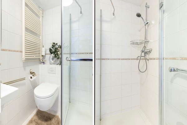 Foto - Te koop: Goed onderhouden tussenwoning in rustige woonwijk!